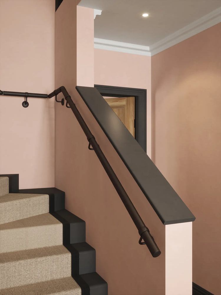 Matt black single winder handrail showing adjustable elbow with turn