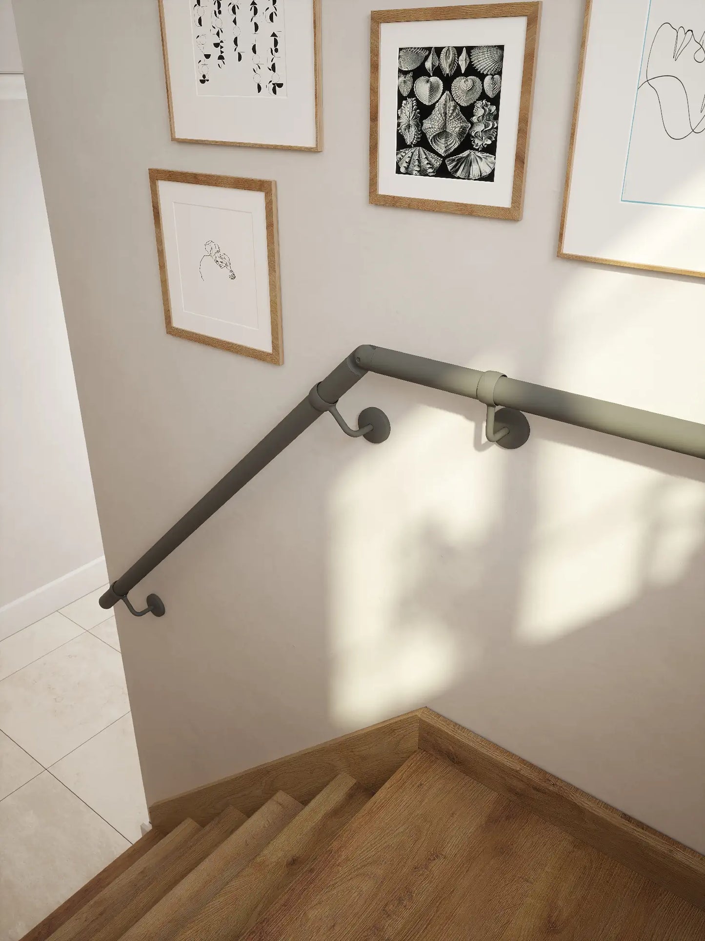 The Luddington textured grey Half Turn handrail system showing support brackets and elbow from rise to level landing