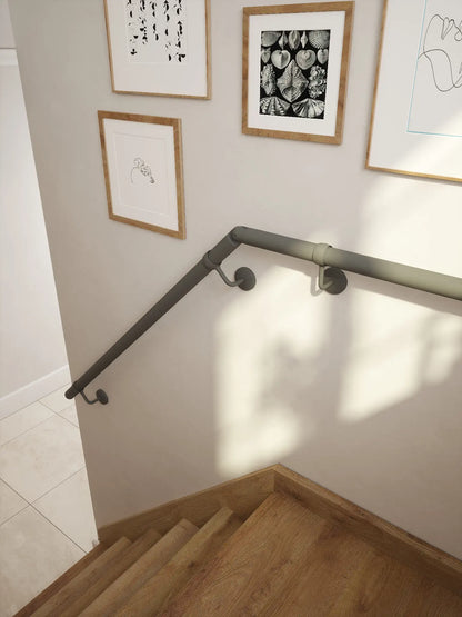 The Luddington textured grey Half Turn handrail system showing support brackets and elbow from rise to level landing