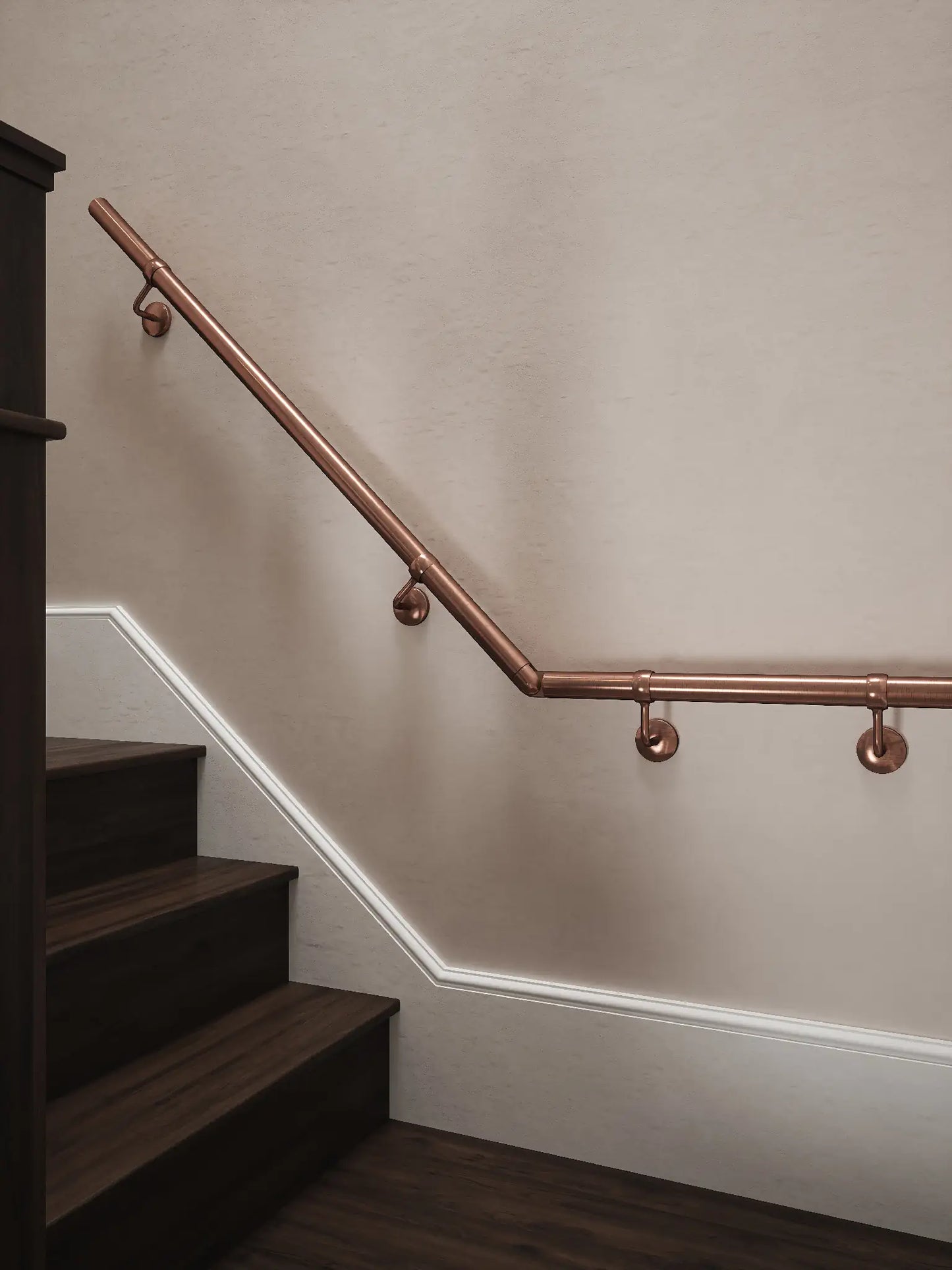 Sambourne Antique Copper Quarter Landing Handrail showing brackets and elbow to final rise
