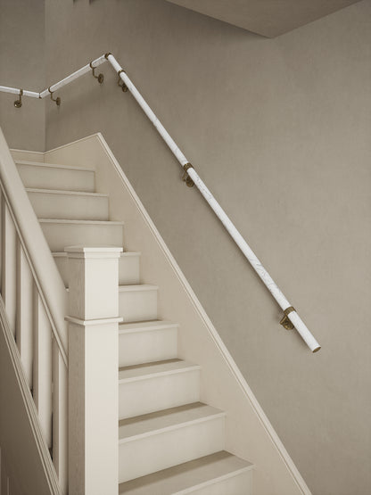 Montford Soft White Marble Quarter Landing Handrail with Loxley Antique Brass brackets