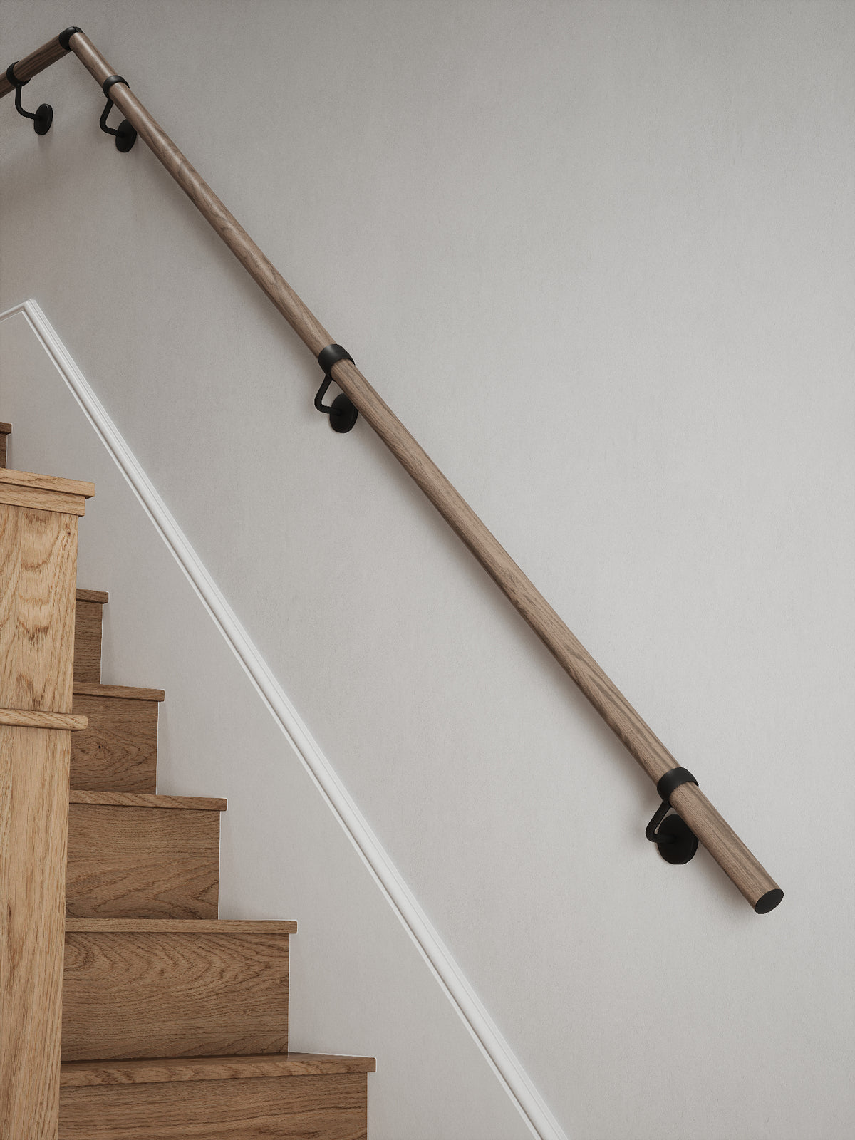 Oversley Walnut Quarter Landing Handrail with Kineton Matt Black brackets