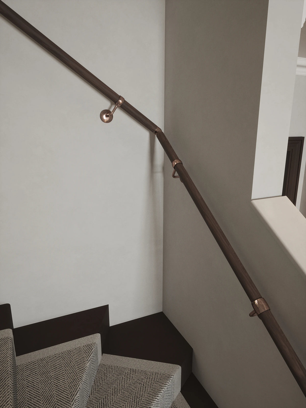 Wroxall Ebony Single Winder Handrail with Sambourne Antique Copper brackets