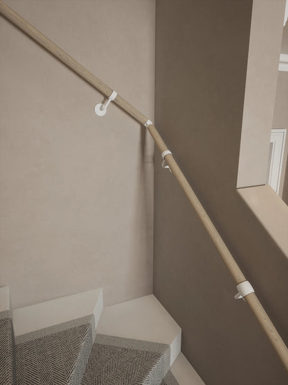 Ryton Teak Single Winder Handrail with Edstone Matt White brackets and an adjustable elbow following the staircase turn.