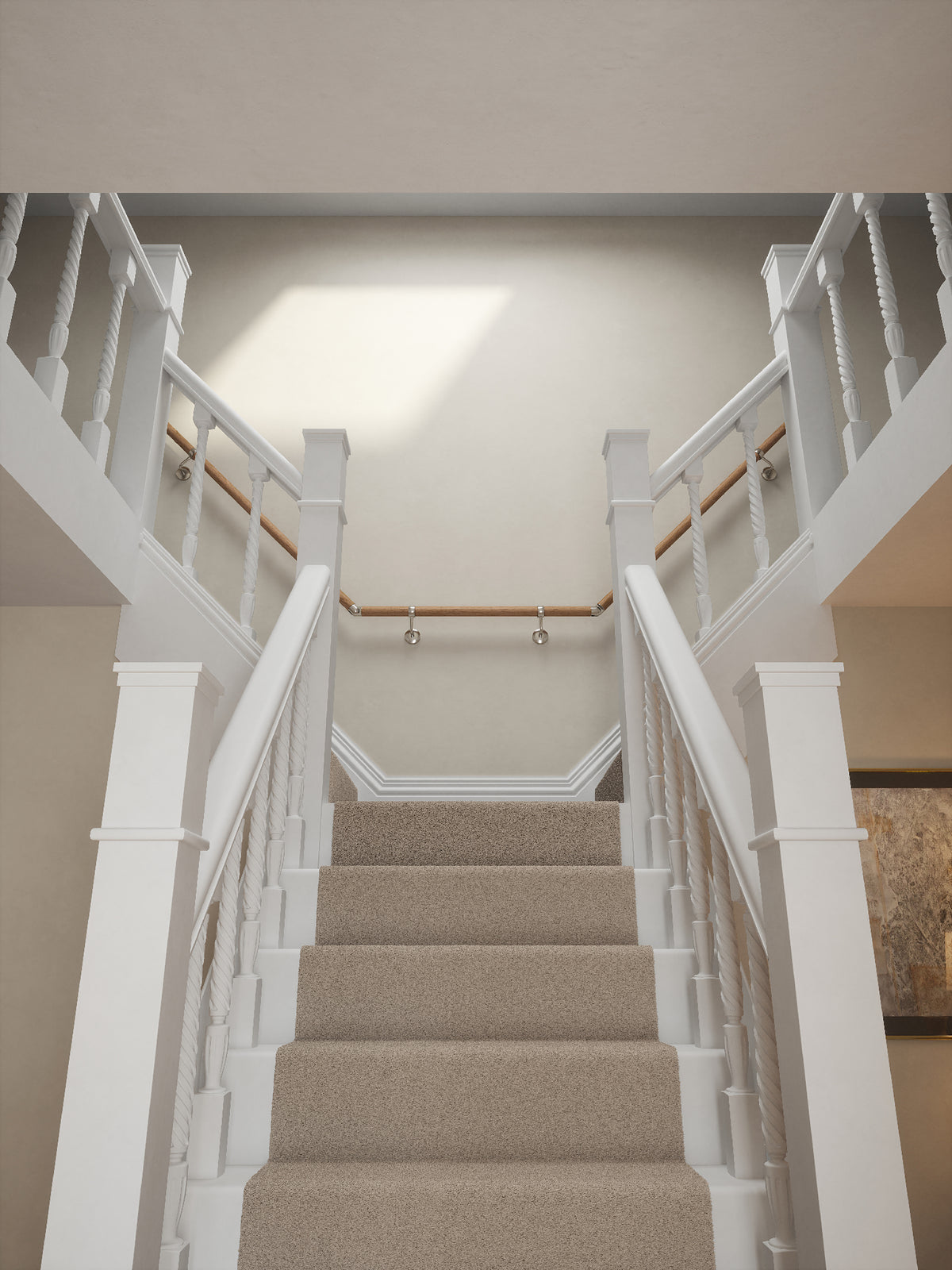 Stoneleigh Red Oak T-shape handrail with silver fittings on a split staircase leading to the landing