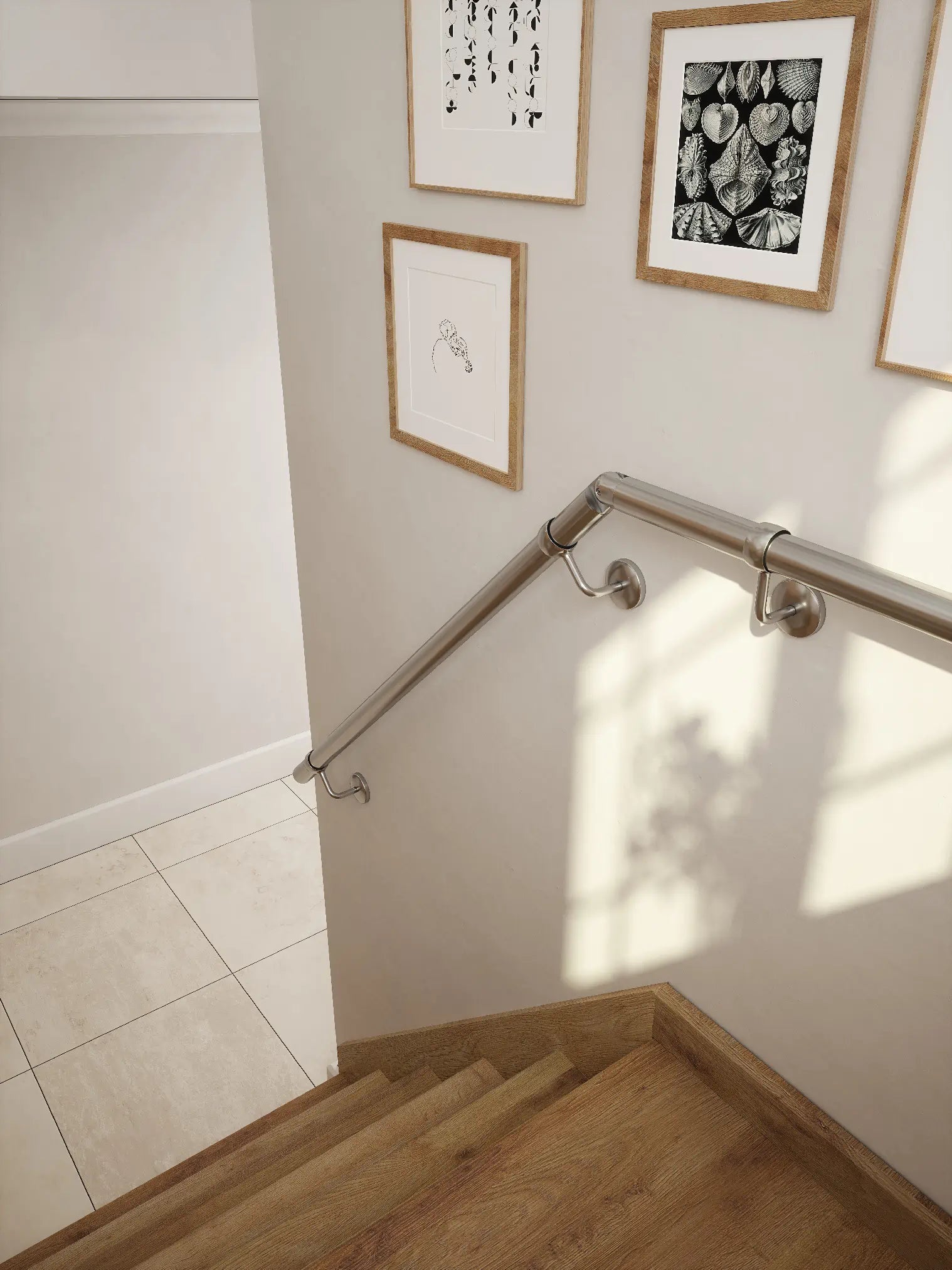 Brushed silver 40mm half turn handrail, close-up wall-mounted detail