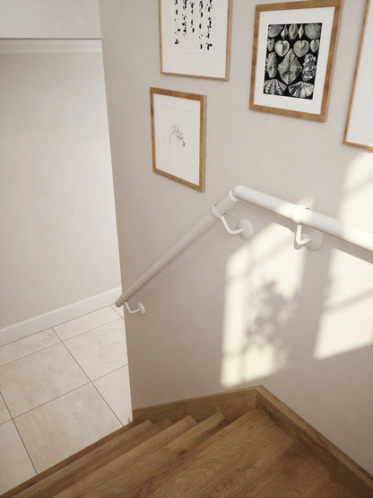 Matt white 40mm half turn handrail, close-up wall-mounted detail