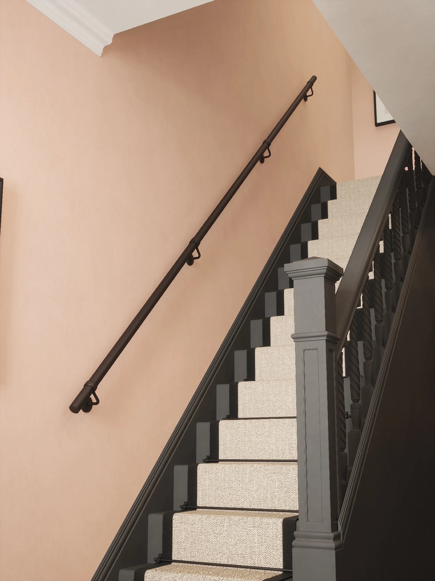Matt black 3.6m straight run handrail installed on staircase wall
