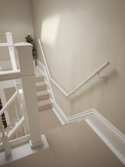 Edstone Matt White wall-mounted handrail on a T-shape staircase, top-down view – Handrails Direct UK supplier of modular indoor handrails and fittings