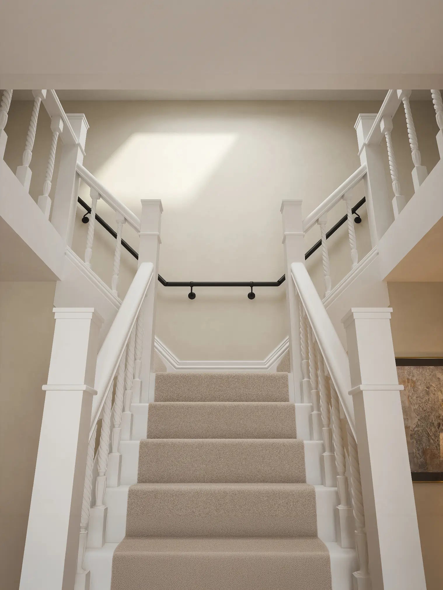 Kineton Matt Black wall-mounted handrail fitted on a T-shape staircase, front view – Handrails Direct UK supplier of modular indoor handrails and fittings