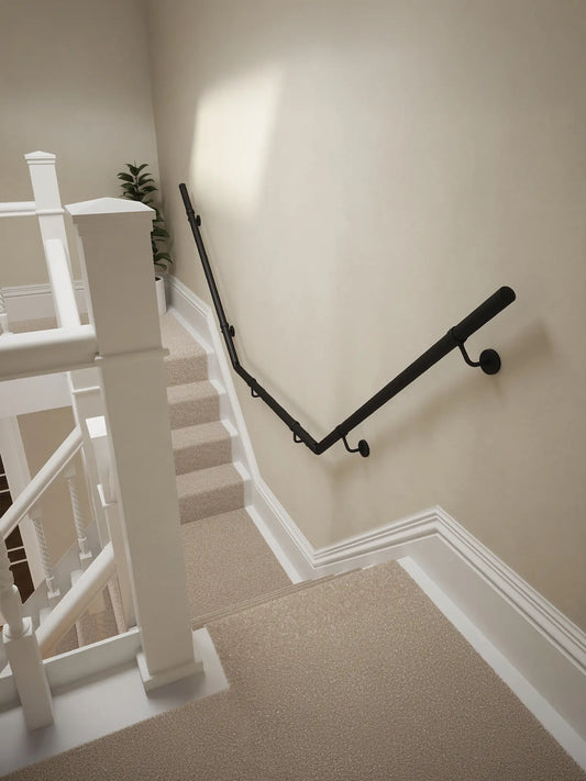 Kineton Matt Black wall-mounted handrail on a T-shape staircase, top-down view – Handrails Direct UK supplier of modular indoor handrails and fittings