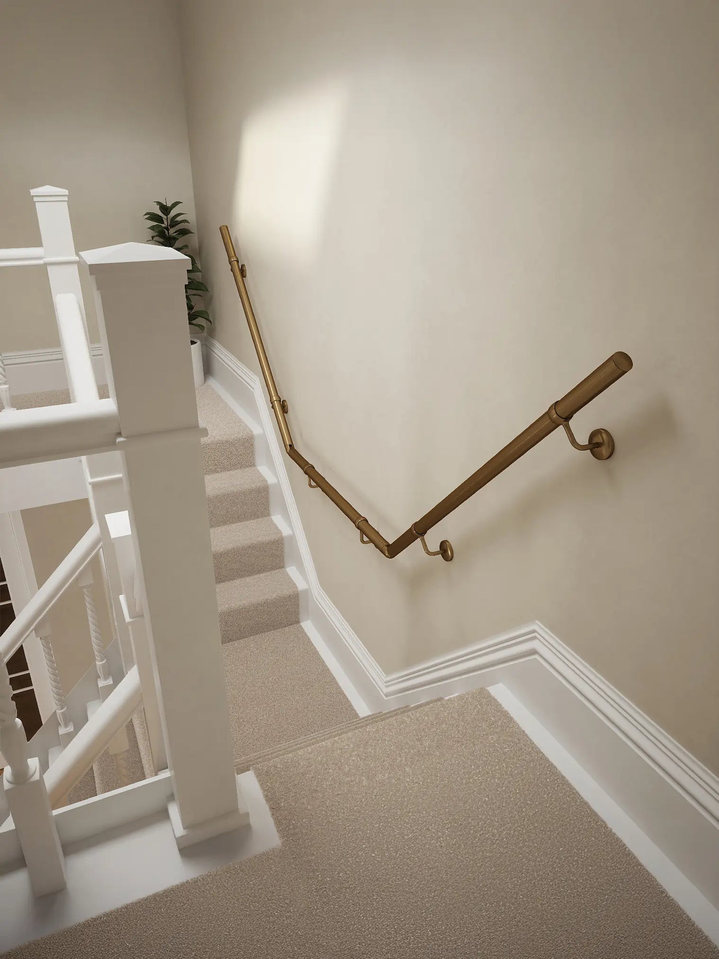 Loxley Antique Brass wall-mounted handrail on a T-shape staircase, top-down view – Handrails Direct UK supplier of modular indoor handrails and fittings